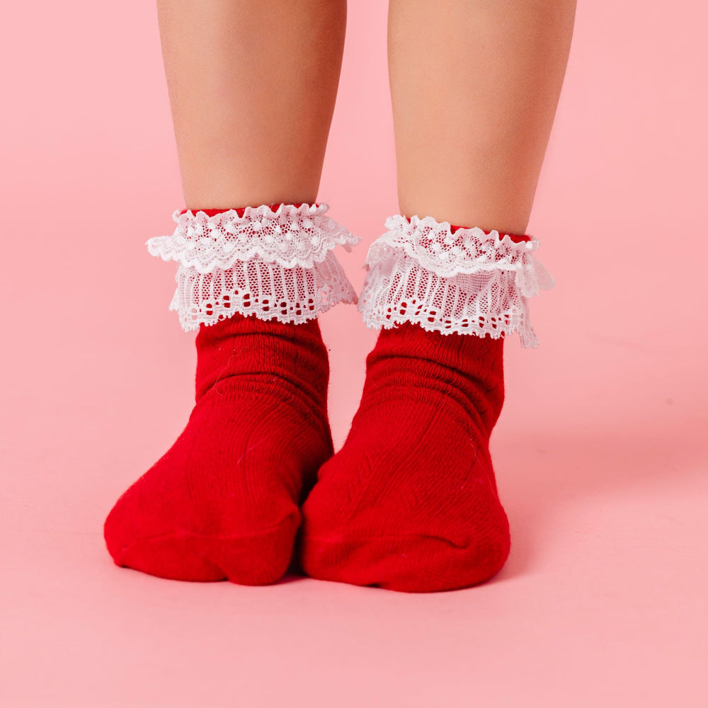 girl in red knit bobby socks with white double lace detail at ankle