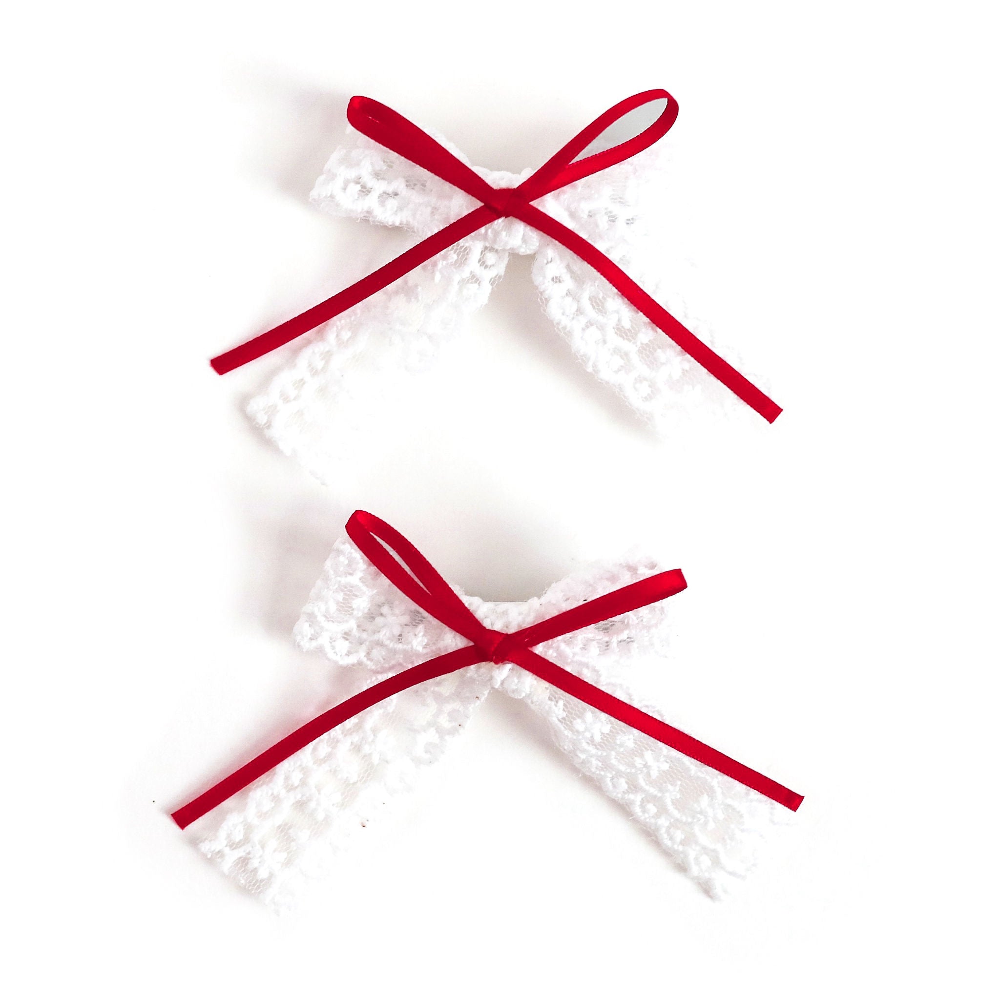 girls white lace pigtail bows with red satin ribbon detail to match Valentine's outfits