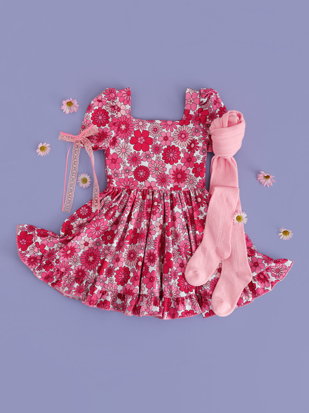 girls' retro pink floral print twirl dress paired with light pink pointelle tights and pink lace and ribbon hair bow