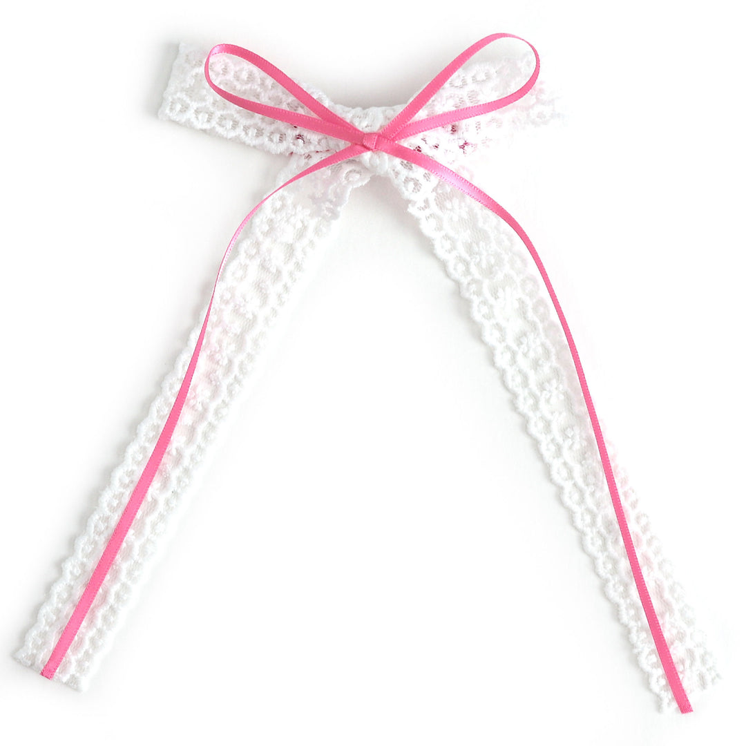 white lace hair bow with layered pink ribbon