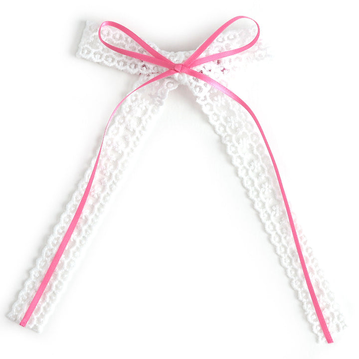 white lace hair bow with layered pink ribbon