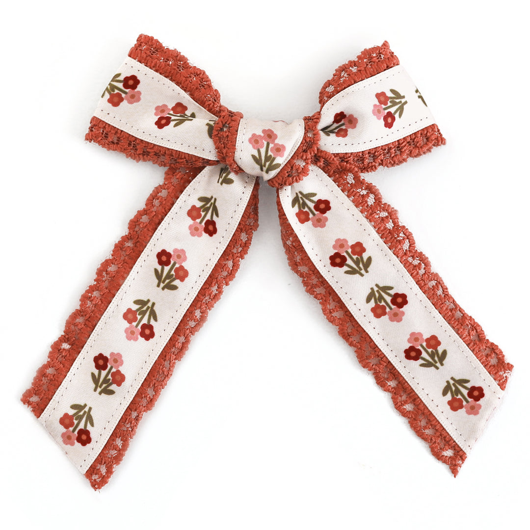 girls cream ribbon bow with rust lace trim and petite fall floral print