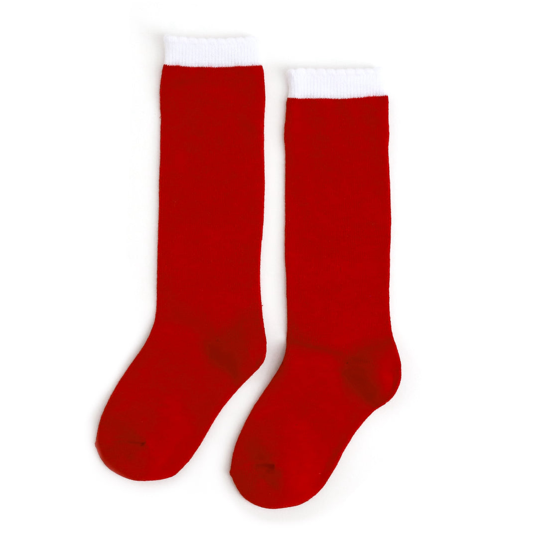 little girls Christmas knit knee high socks in bright red with white scalloped trim 