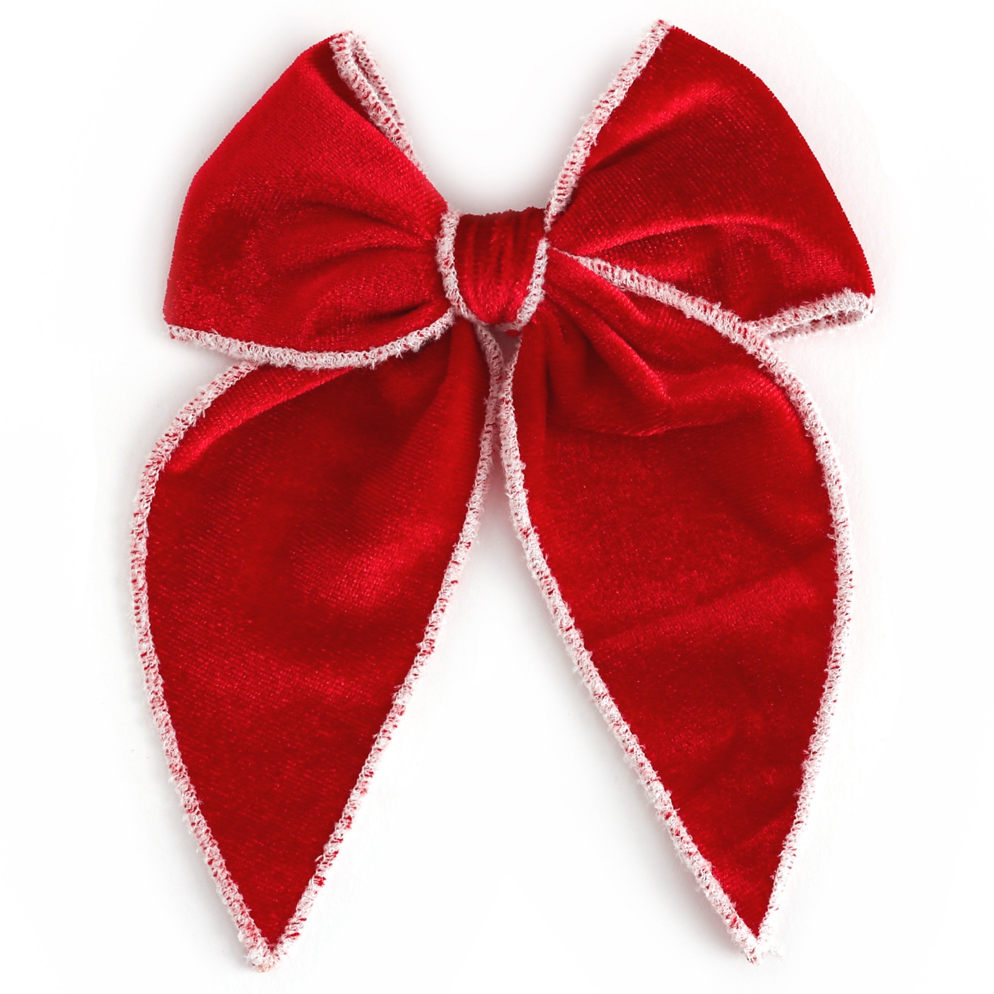 girls' red velvet Christmas bow with white velvet trim on clip