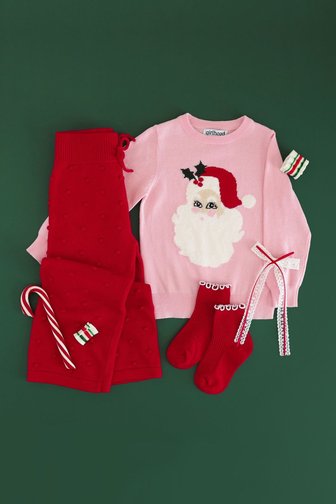 christmas knitwear outfit, pink vintage santa sweater with red bubble knit sweater pants