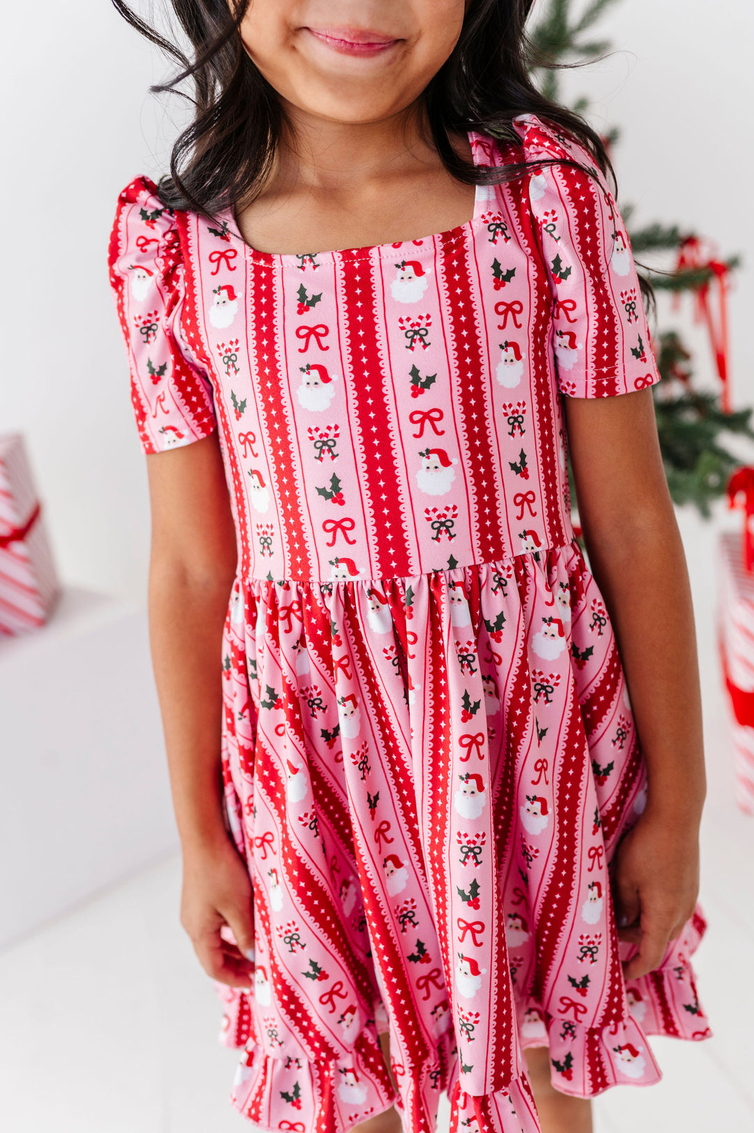 pink and red santa wallpaper print twirl dress 