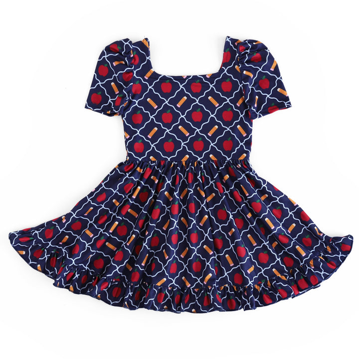 girls navy square neck twirl dress with apple and pencil themed print for back to school