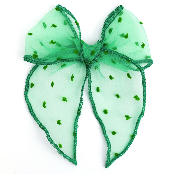 st. patricks day hair bow in sheer green shimmer with sparkly green trim