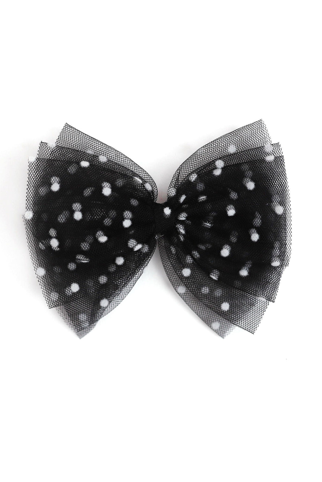 A black tulle bow decorated with small white polka dots, photographed against a solid white background.