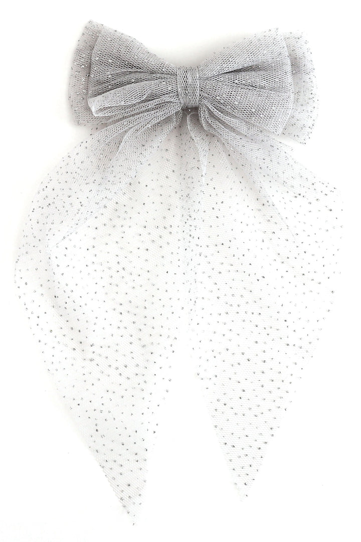 sparkly silver tulle hair bow photographed on plain white background