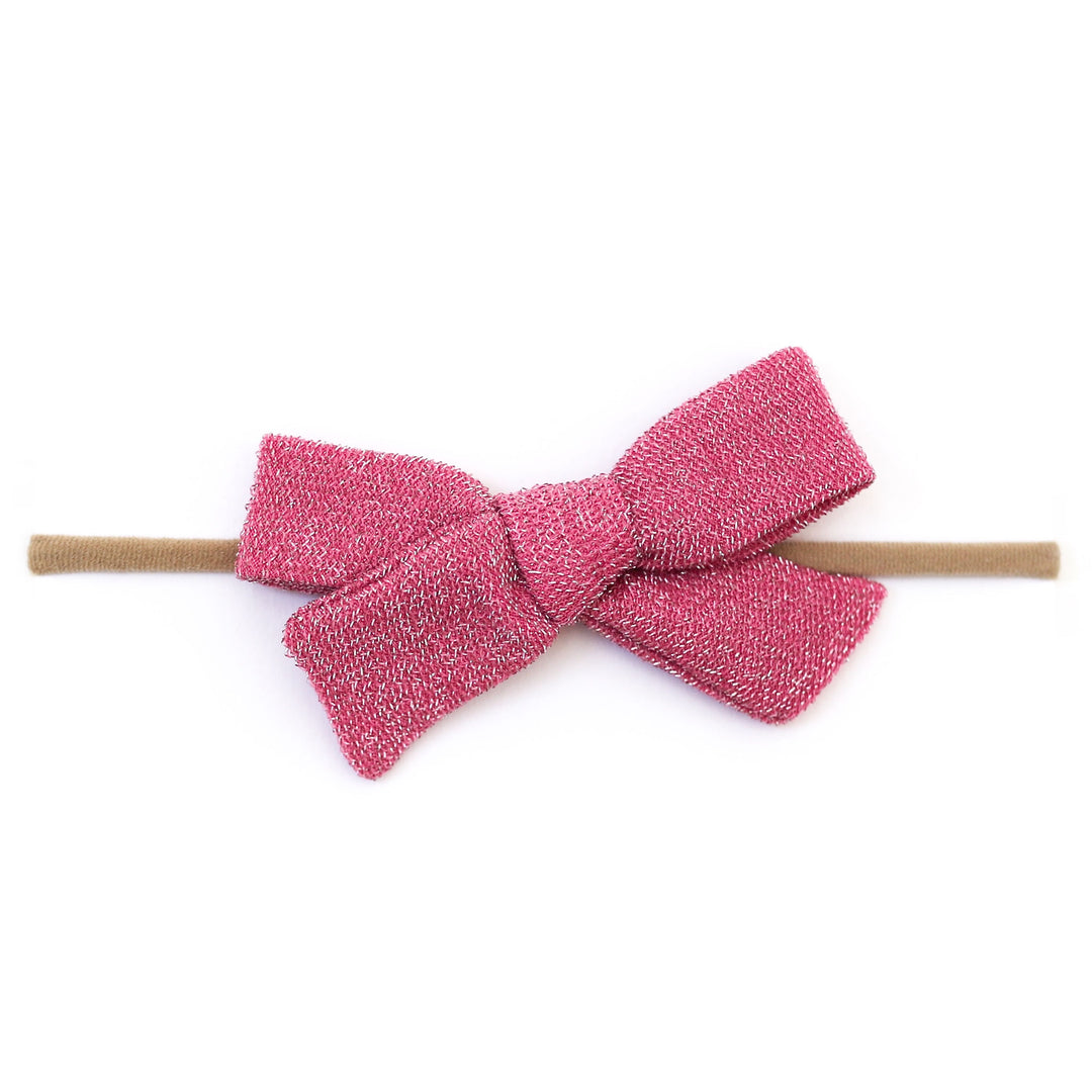 sparkly pink baby bow on nylon headband
