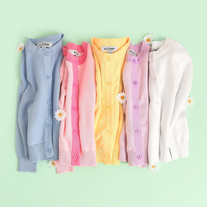 girls' spring and easter cardigans with scallop trim detail in blue, pink, yellow, purple and white