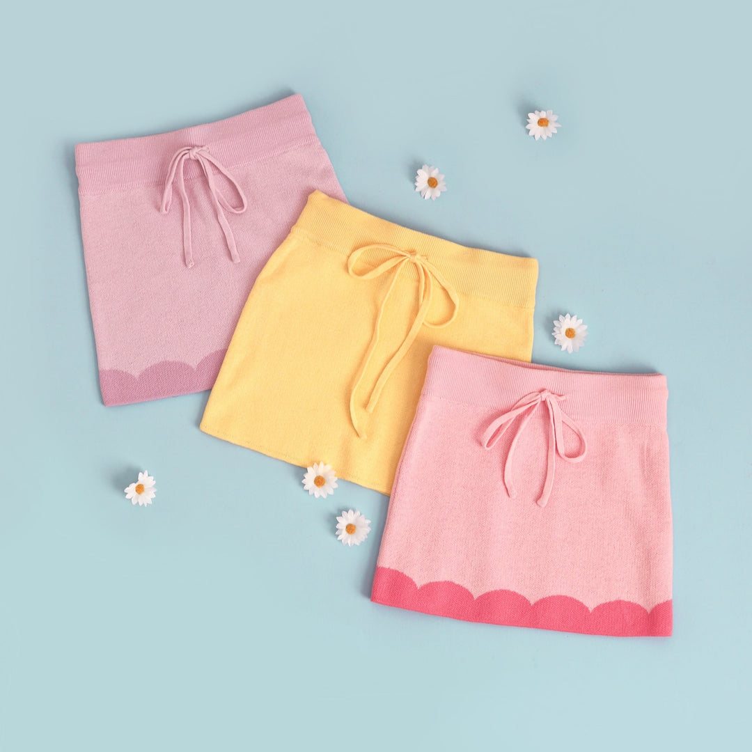 spring girls knit skirts with functional drawstring in yellow, purple, and pink