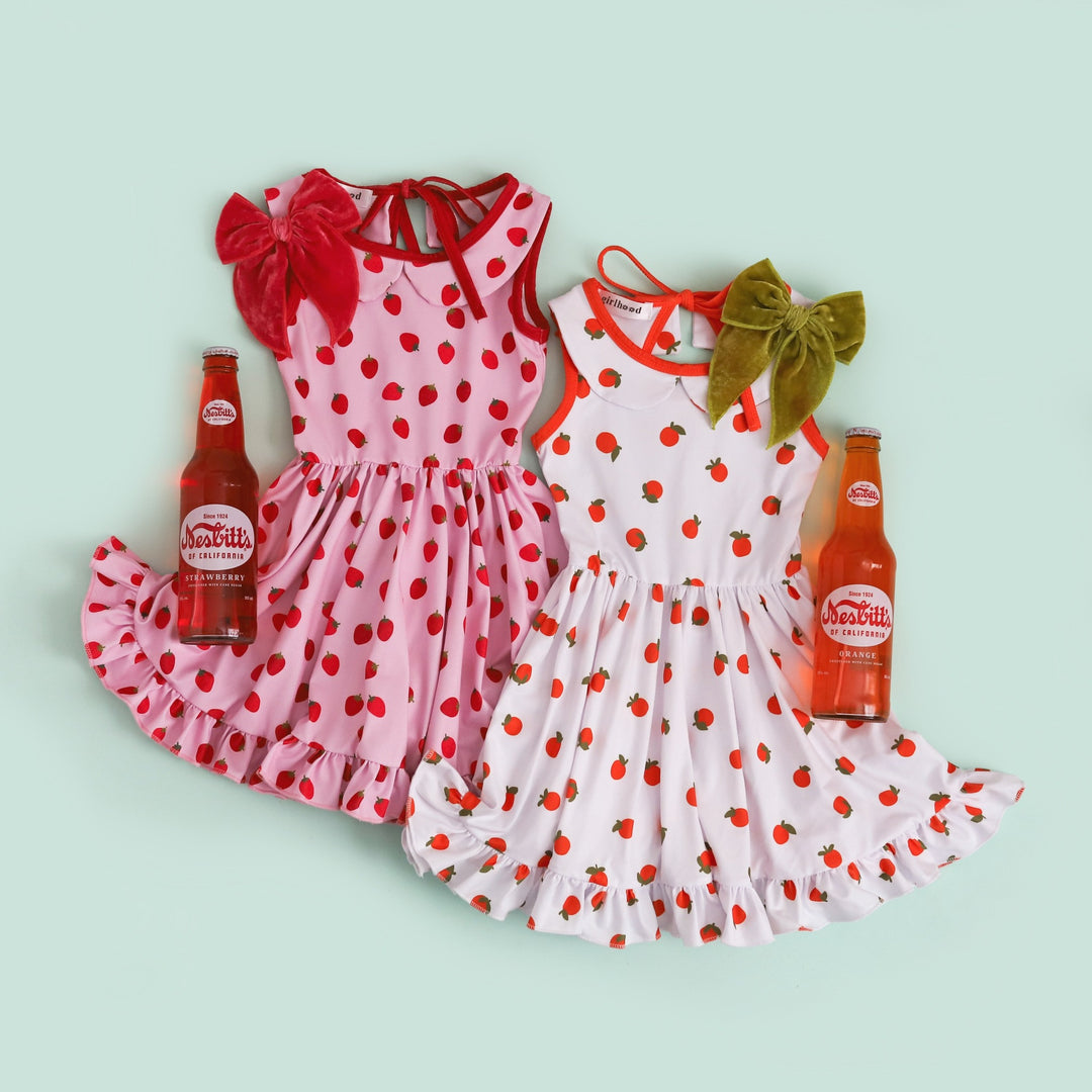 girls' fruit inspired tank top dresses in cute strawberry and orange prints
