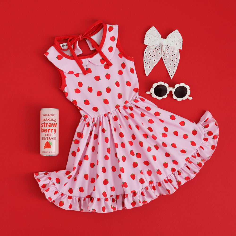 girls' strawberry print tank top summer drop paired with cute white eyelet hair bow