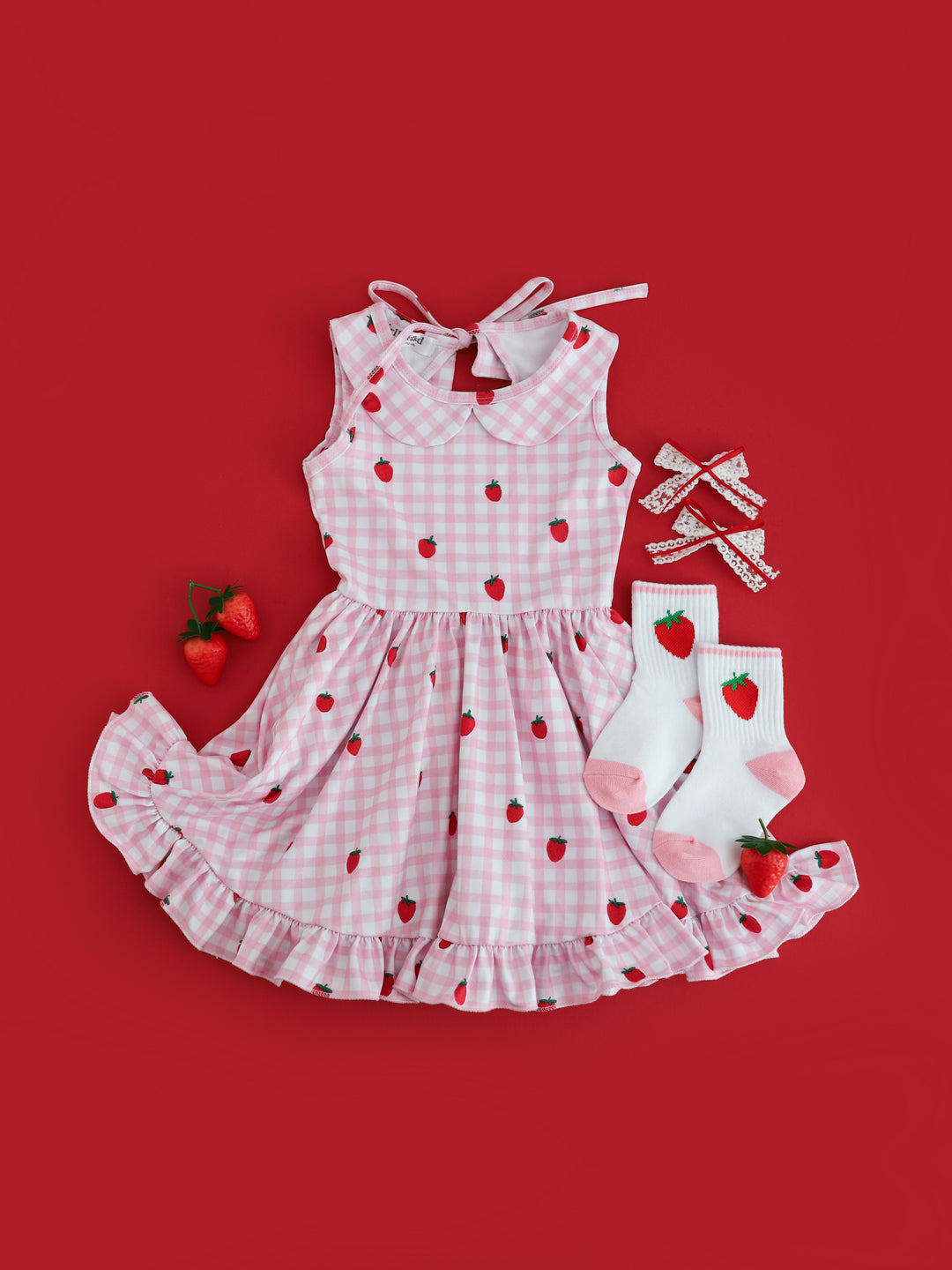 girls' pink gingham with red strawberry summer twirl dress with matching strawberry crew socks and lace ribbon pigtail bows