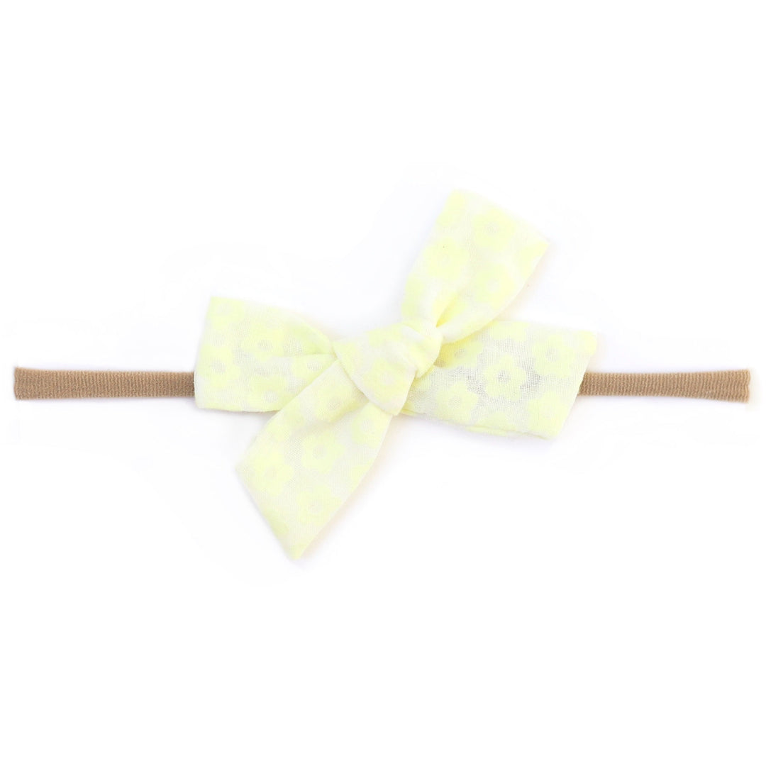 sheer sunshine yellow floral baby bow on nylon headband