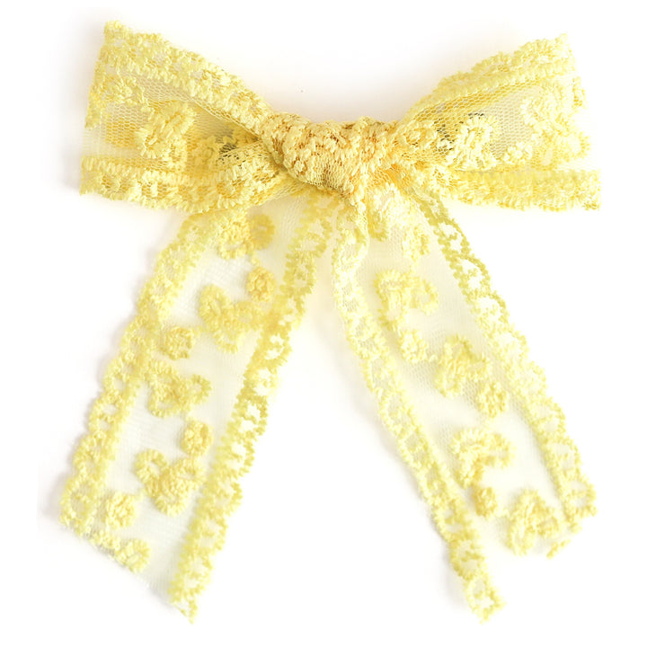 girls' pastel yellow hand tied lace bow on clip for spring