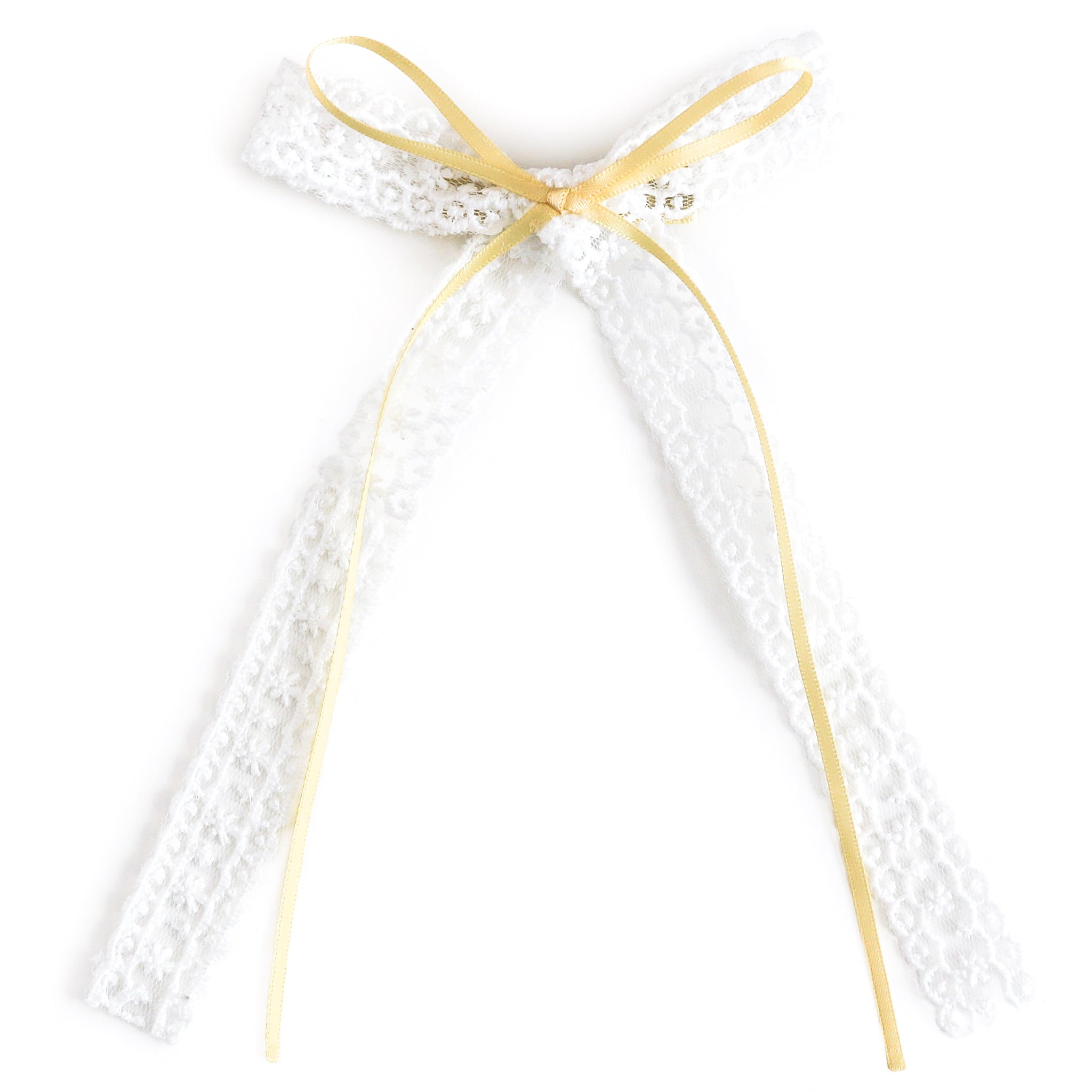 girls' long tail, white lace bow on alligator clip with pastel yellow satin ribbon bow attached 