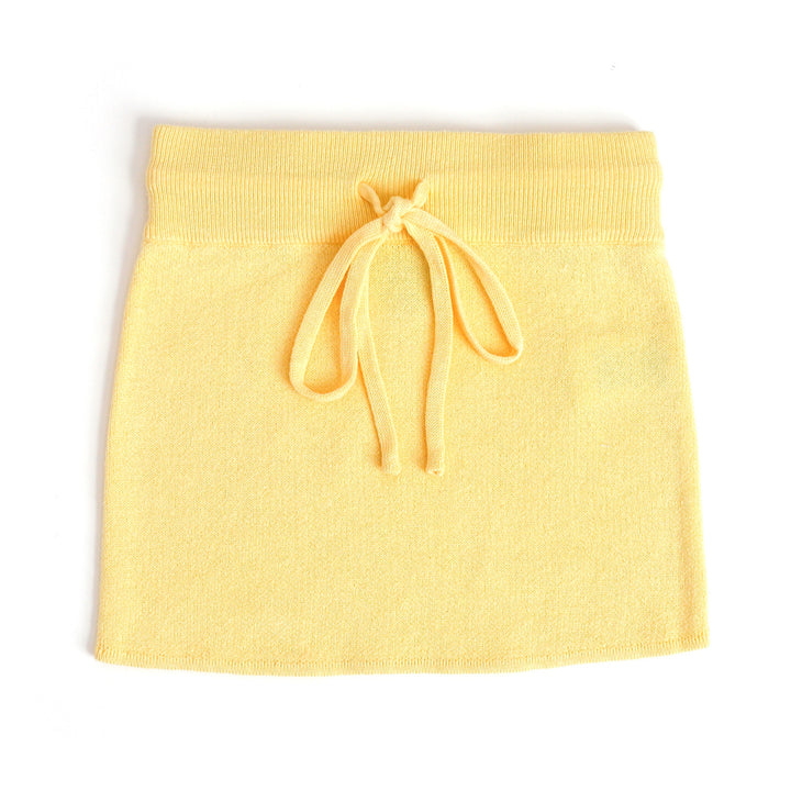 girl's cotton knit sweater skirt in pastel yellow with functional drawstring waistband for spring