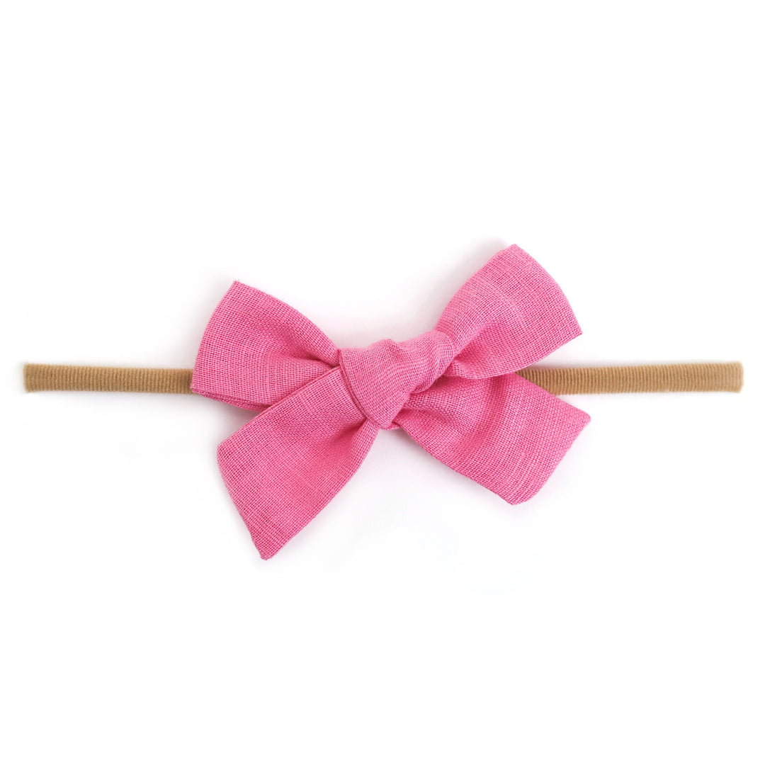 bright pink linen baby bow on nylon headband