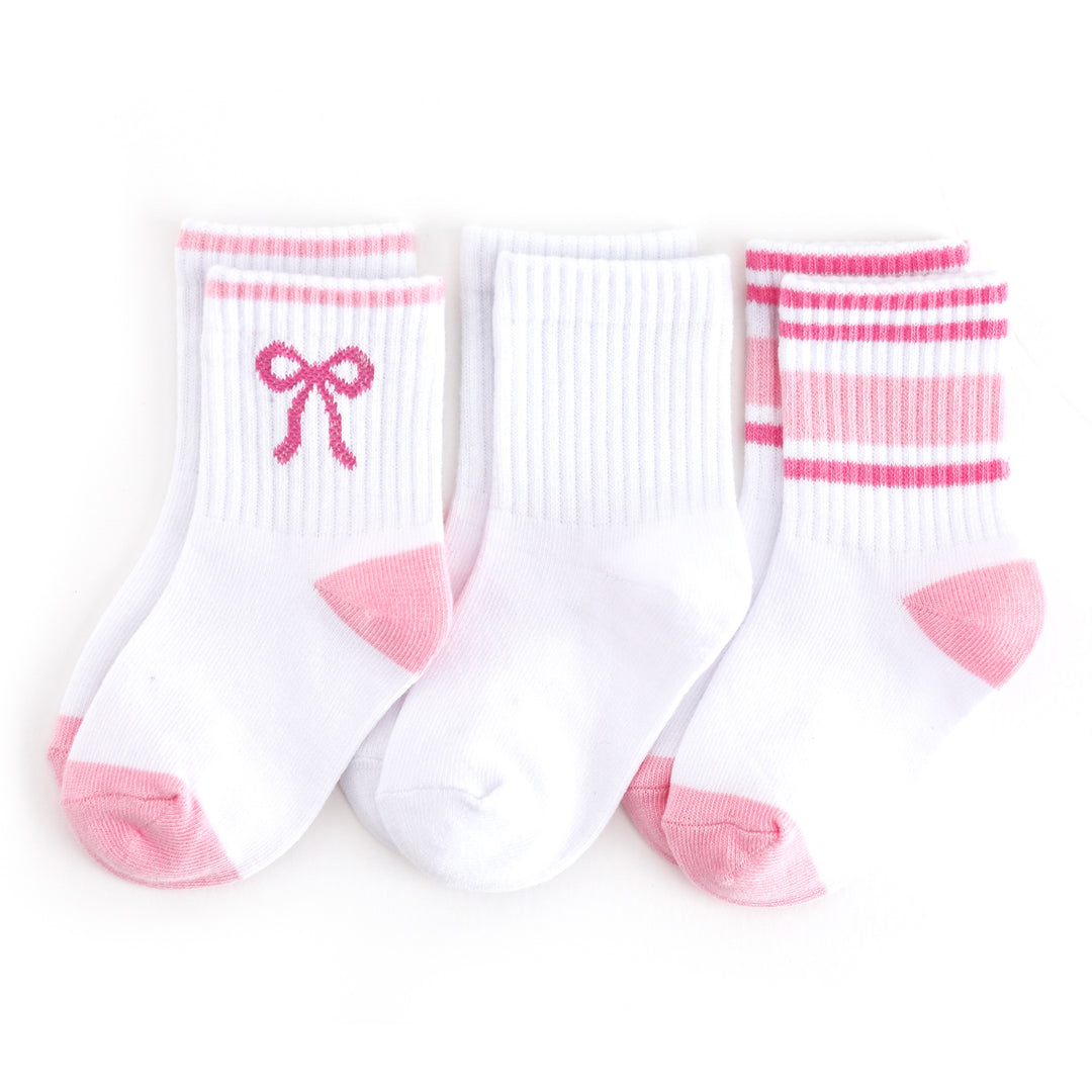 three pack of girls' white crew socks with taffy bow, solid white and taffy stripe designs