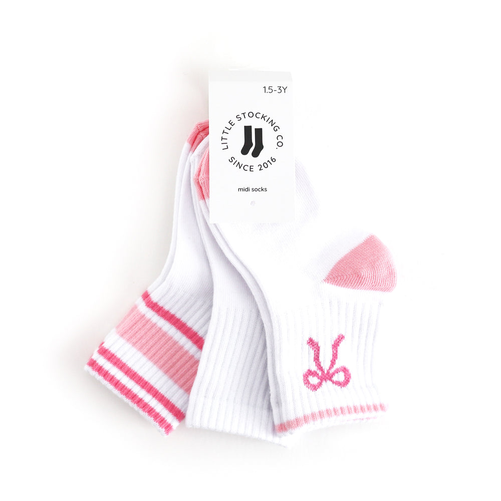 tagged three pack of girls' white midi length crew socks with pink details 