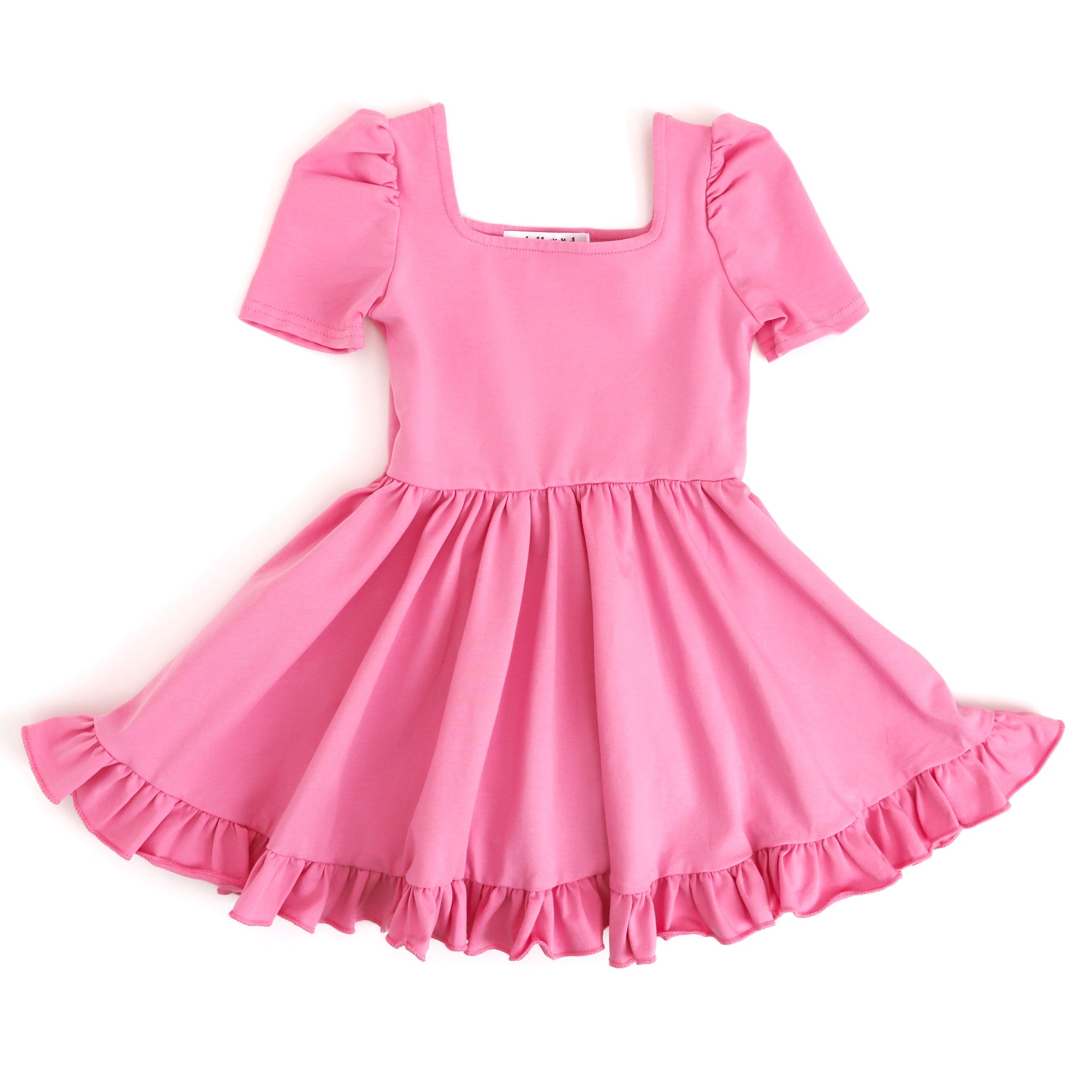 little girls pink party dress with short puff sleeve, square neckline and ruffled hem