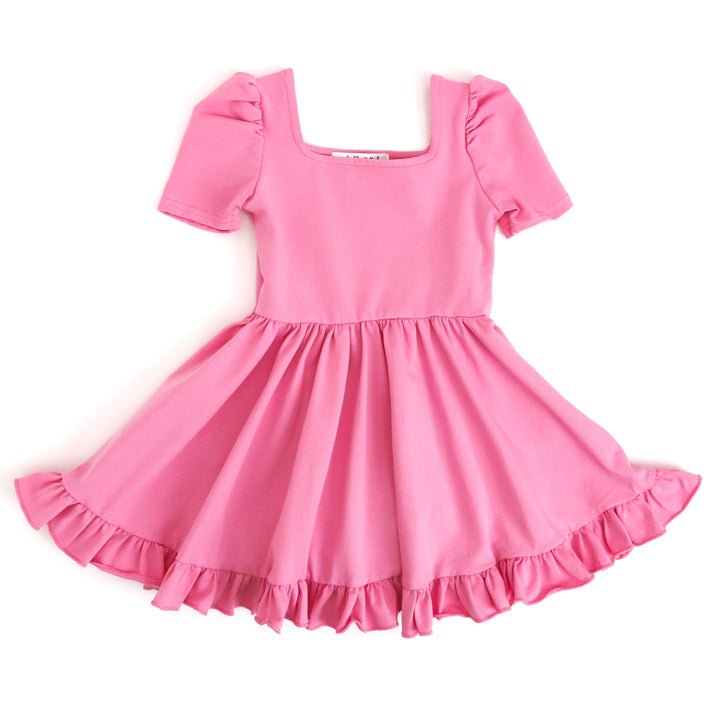 little girls pink party dress with short puff sleeve, square neckline and ruffled hem