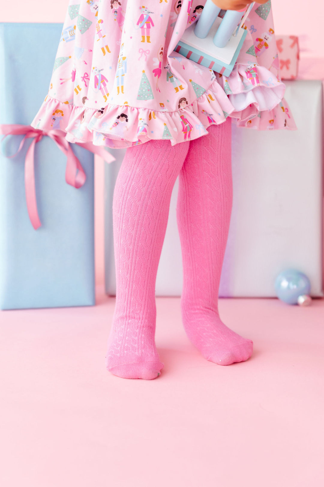 girls bright pink cable knit tights with nutcracker christmas dress