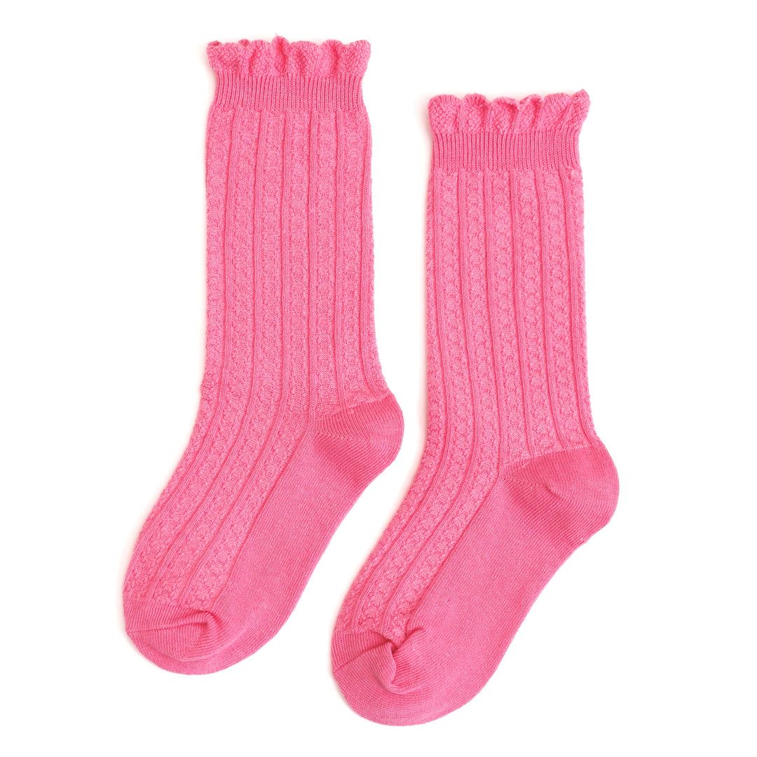 girl's pink knee highs socks with dainty vertical knit pattern and scalloped trim