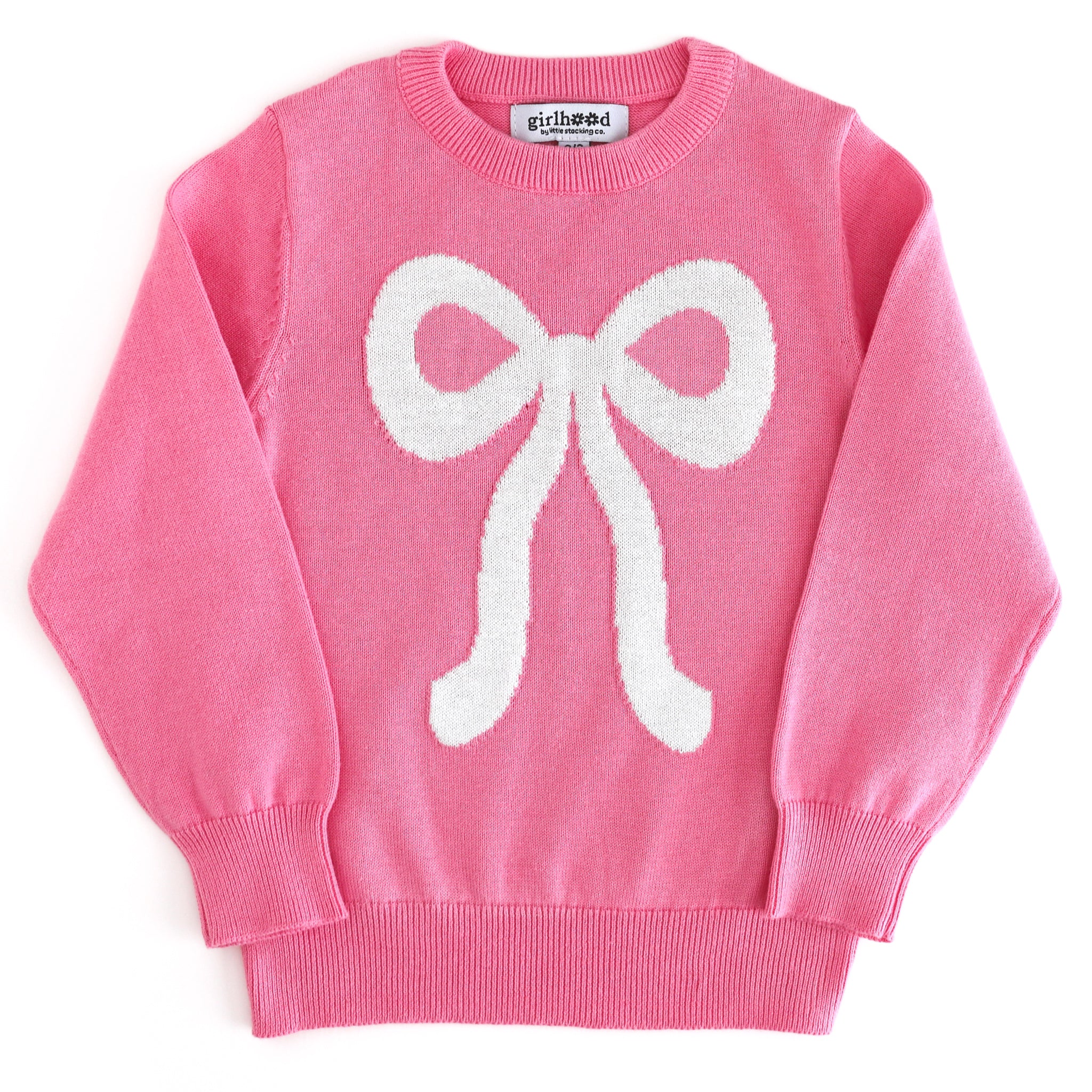 girls' pink knit pullover sweater with sparkly white bow design to match pink Christmas outfits
