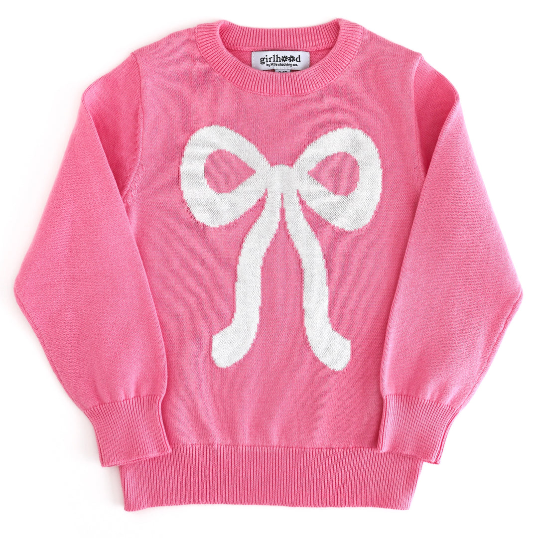 girls' pink knit pullover sweater with sparkly white bow design to match pink Christmas outfits