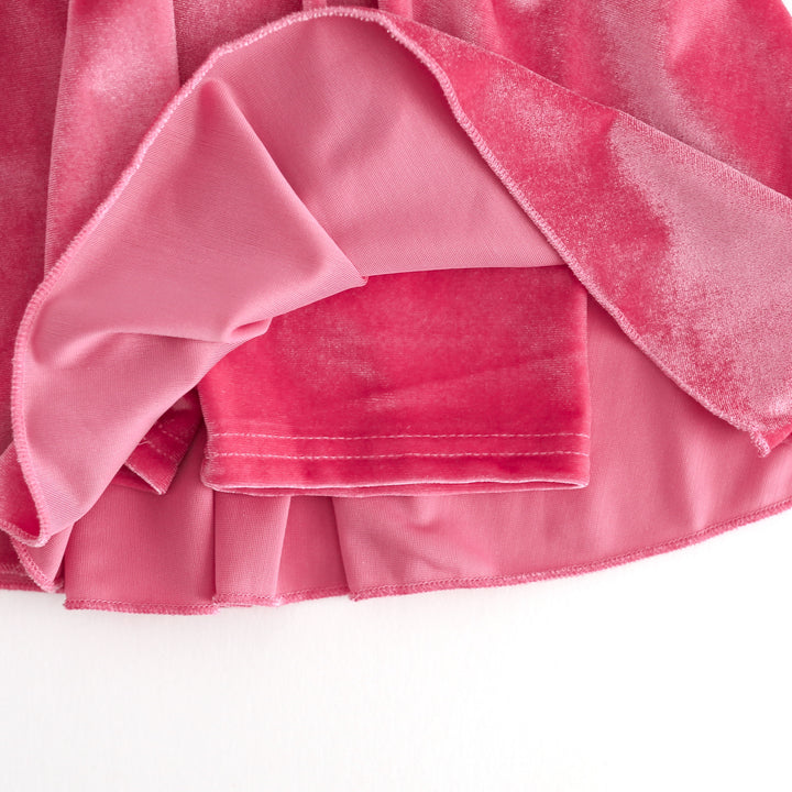 closeup of pink velvet shorts attached to pink velvet valentines skort