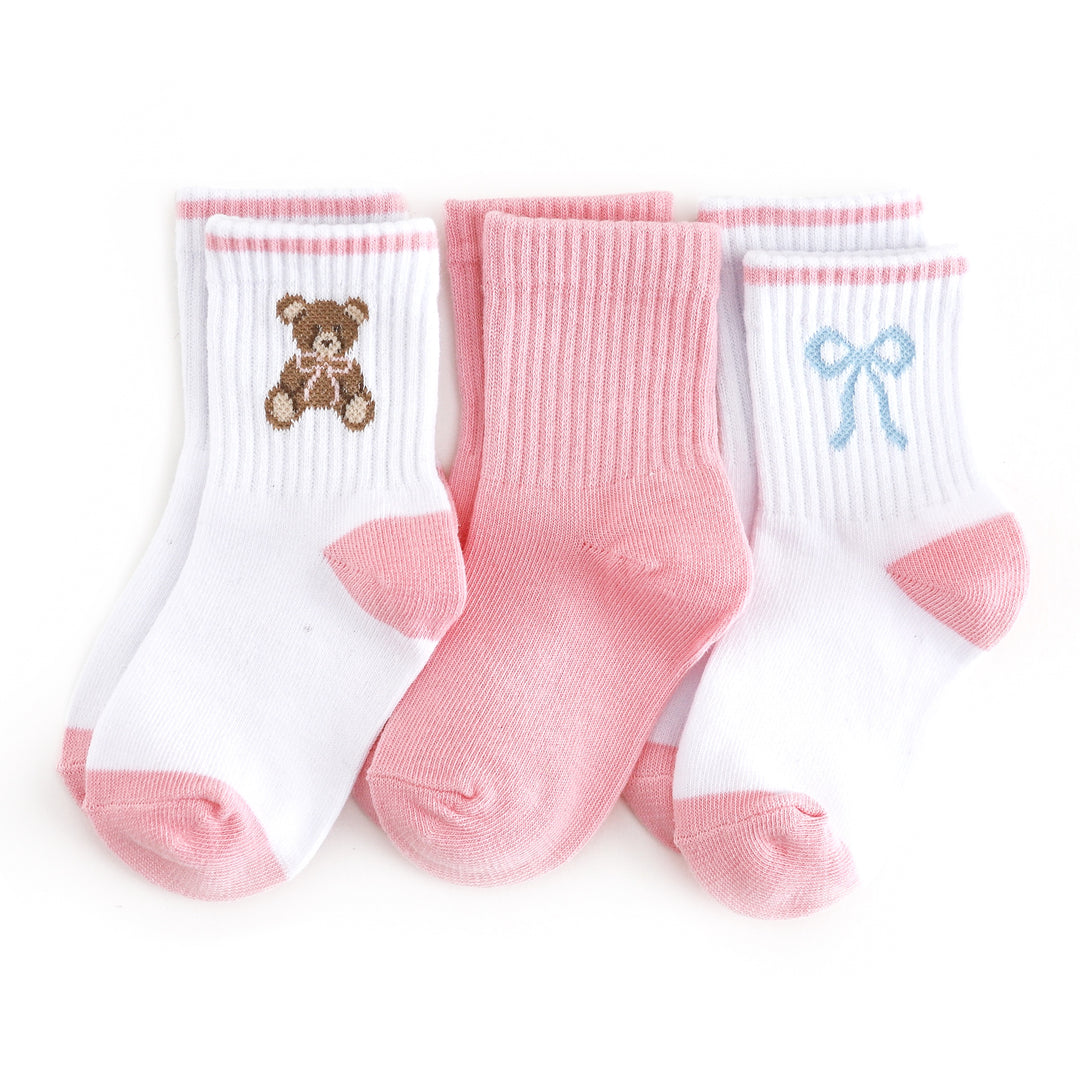 girls crew sock three pack in white with teddy bear, solid pink and white with blue bow design