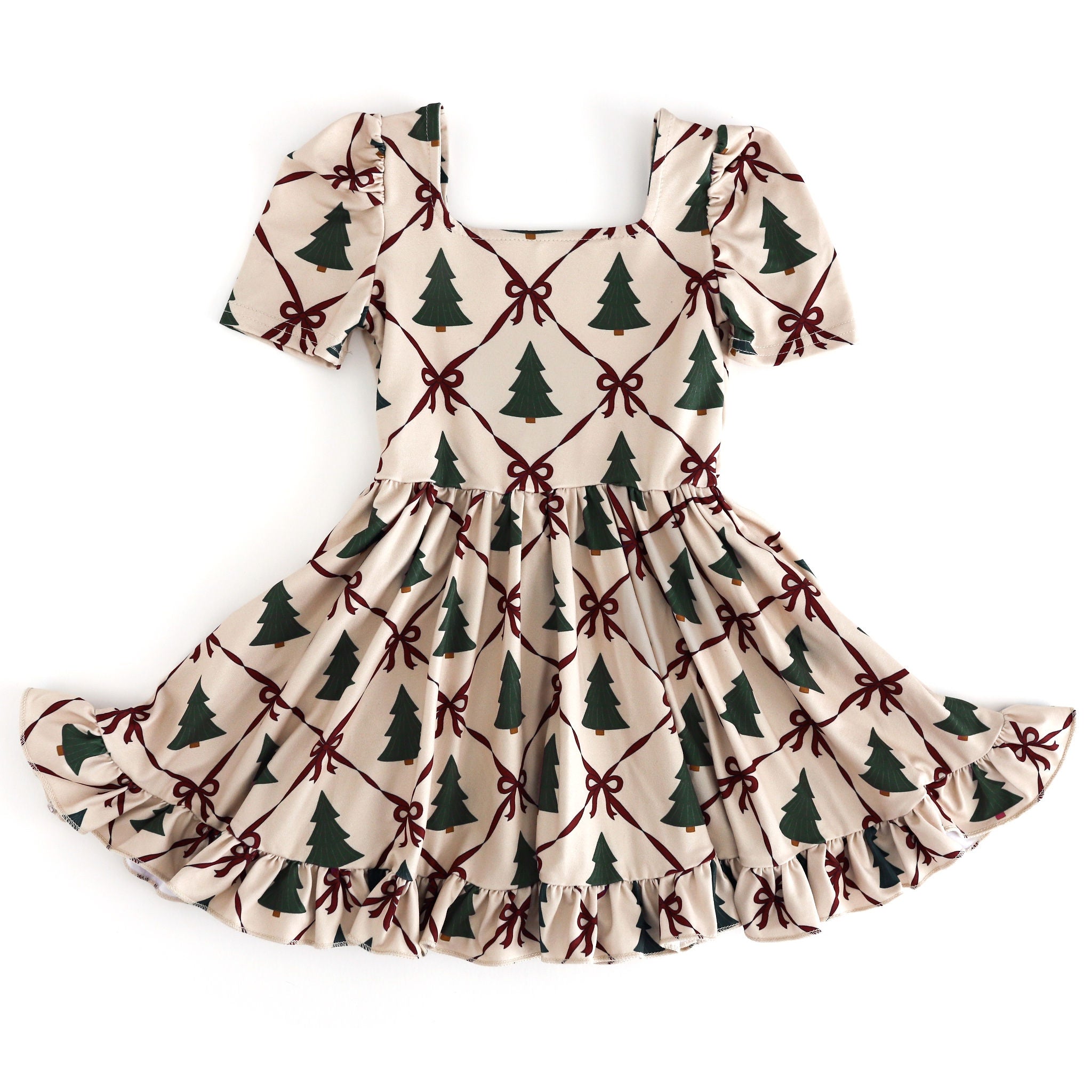 girls short sleeve cream Christmas twirl dress with crimson bow design and green pine tree print