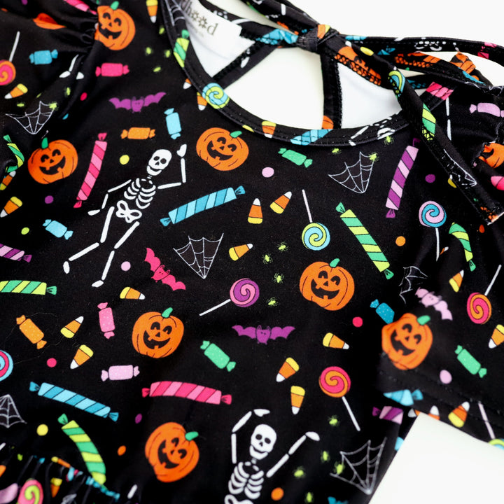 girls' halloween print twirl dress with candy, pumpkins, skeletons & more