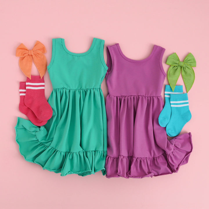 sea glass green and orchid purple girls summer tank dresses styled with bright colored socks and hair bows