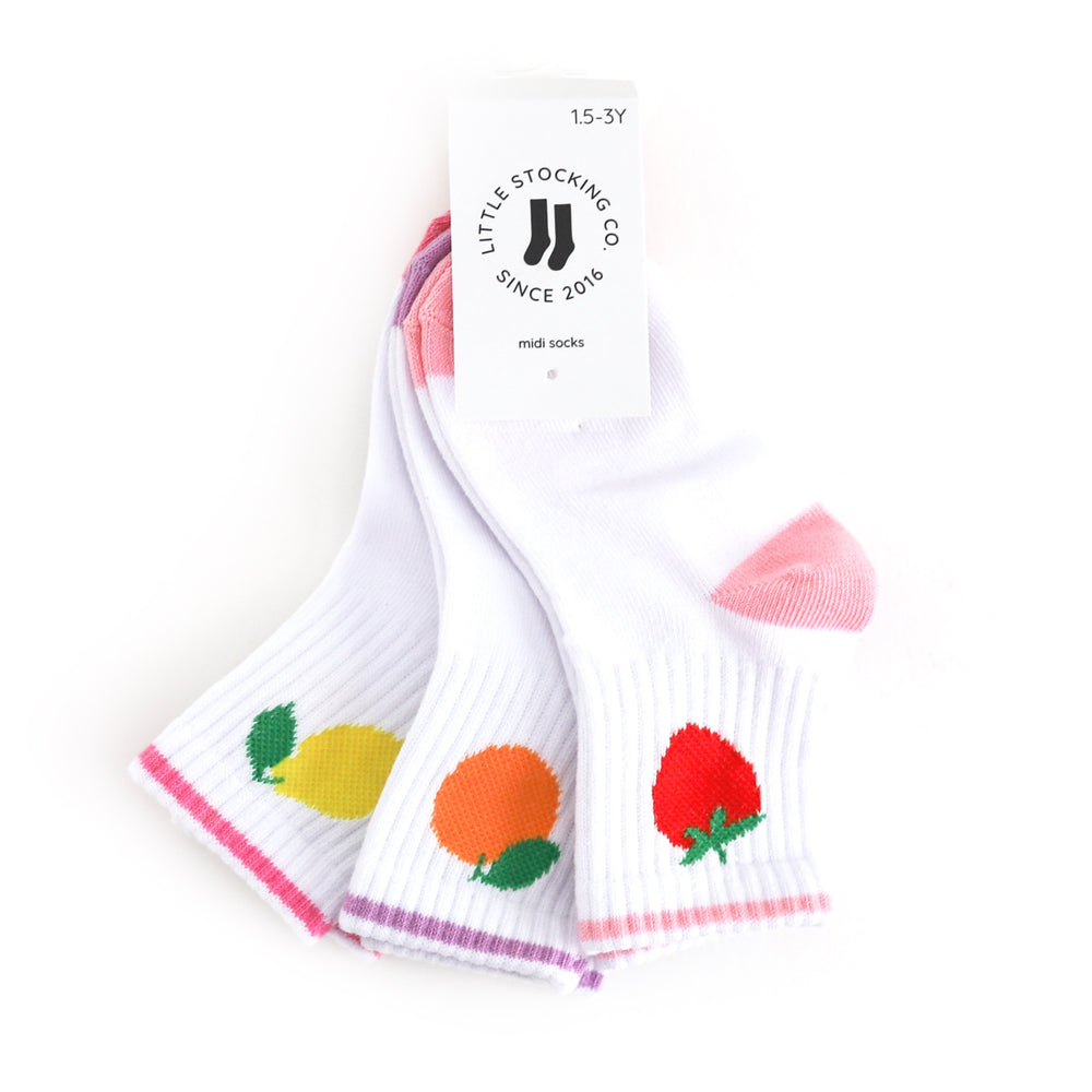 three pack of fruit themed crew socks with strawberry, lemon and orange designs