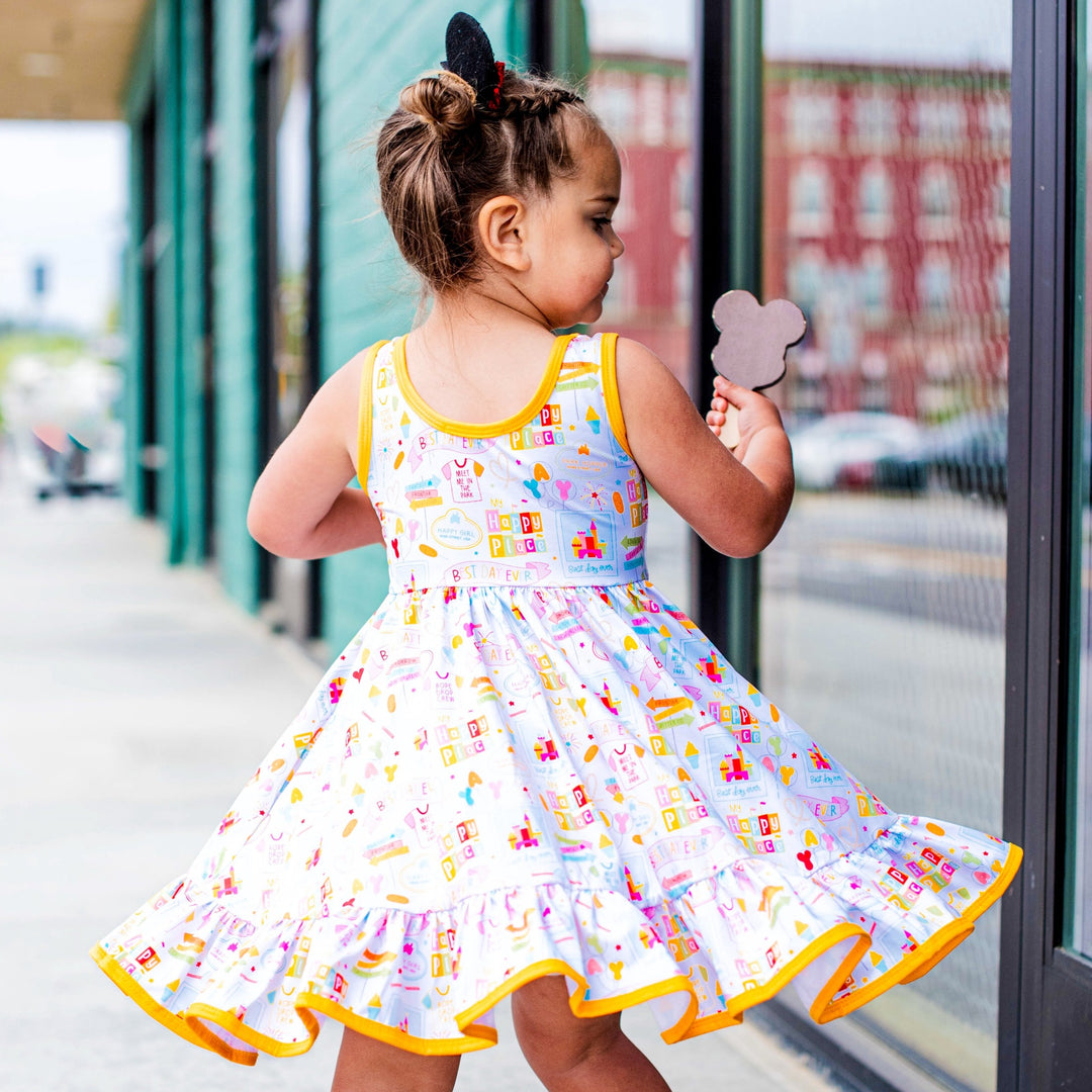 little girl twirling in disney inspired summer twirl dress