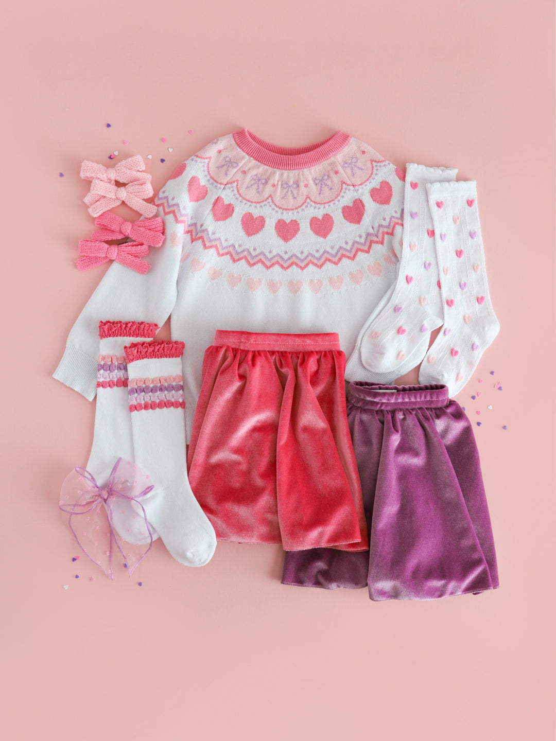 girls pastel valentines themed fair isle sweater to mix and match with velvet skort, sock and bow options in shades of pink, lavender and white