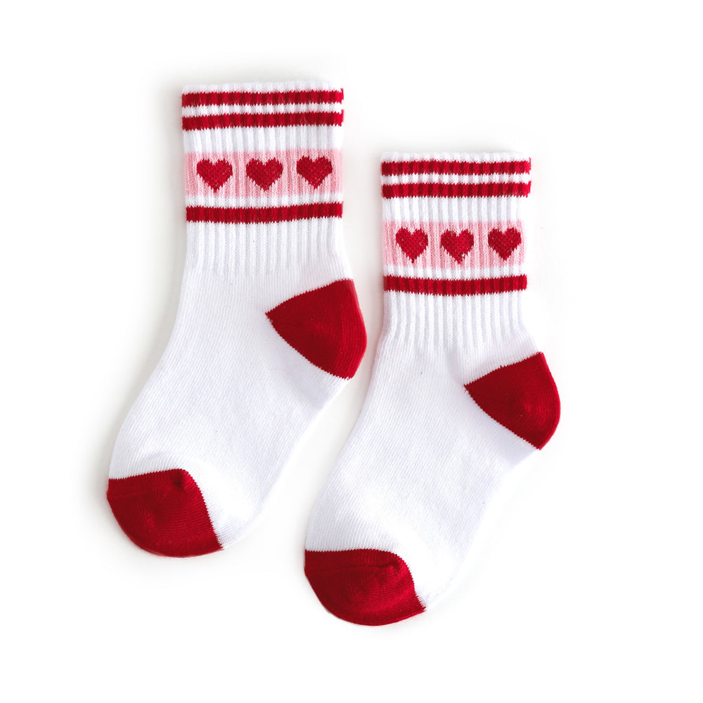white athletic crew socks with red and pink stripe and heart design and red toe and heel details for Valentine's day