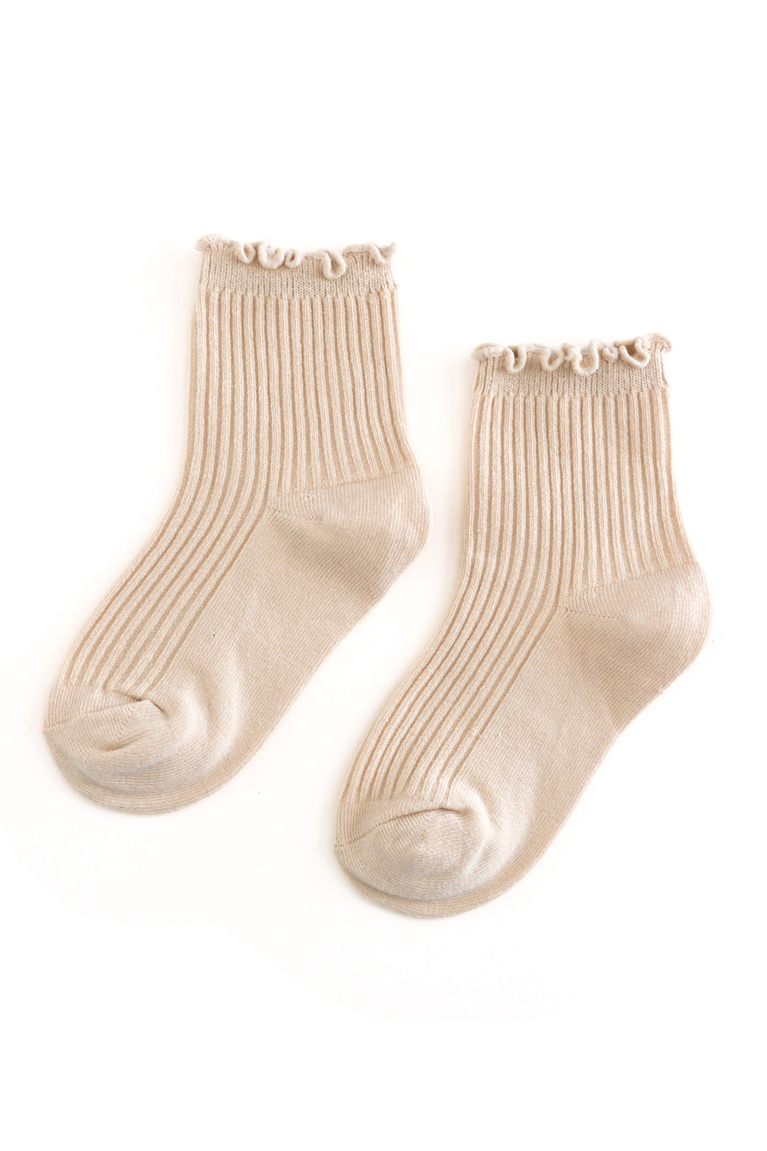A pair of ribbed ankle socks in a light beige or cream color, featuring a delicate ruffled trim along the top cuff, displayed on a clean white background.