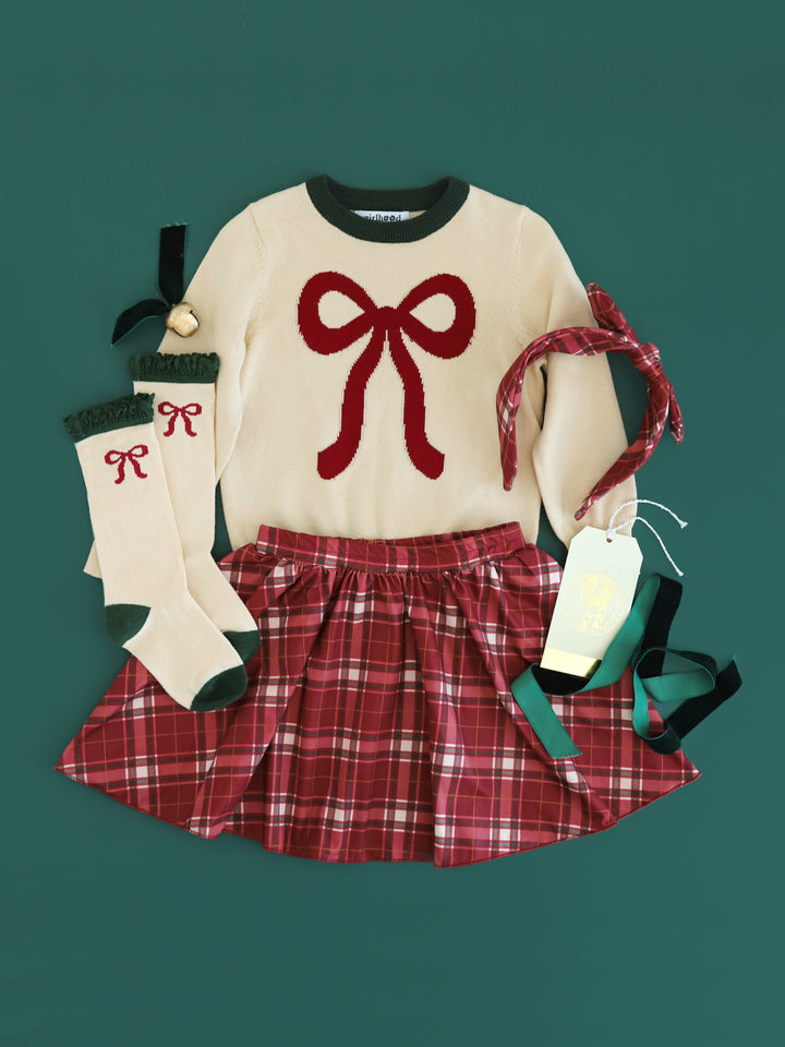 girls' made to match cream and crimson bow sweater and knee high socks aired with matching crimson plaid skirt and headband