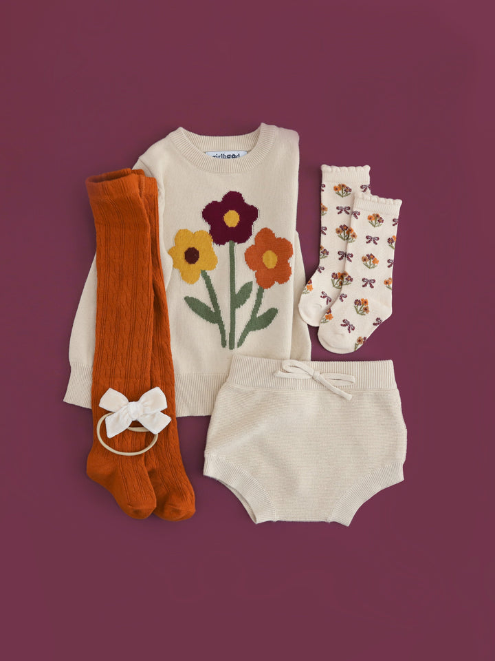 baby girl sweater and bloomer set in cream with fall floral bouquet design, pumpkin cable knit tights and matching floral knee highs