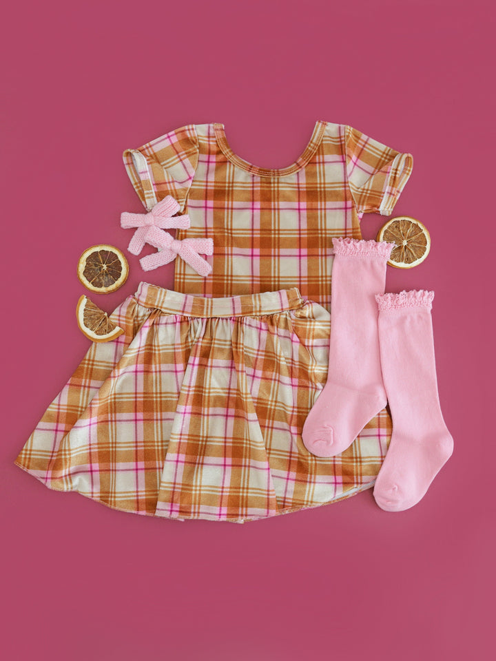 girls' fall velvet fitted top and skort in vanilla, mustard and pink plaid with matching ink knee highs and knit pigtail bows