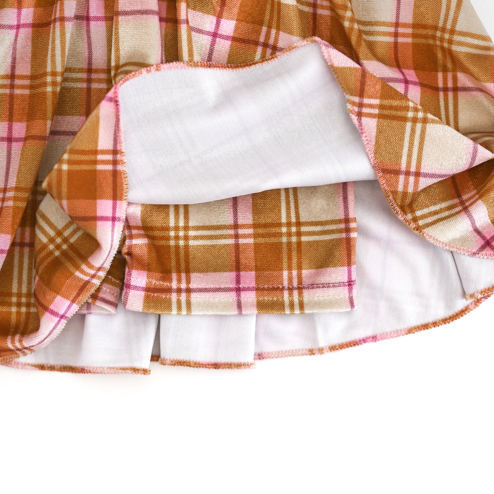 closeup of girls' velvet shorts attached to skort in vanilla plaid print for fall