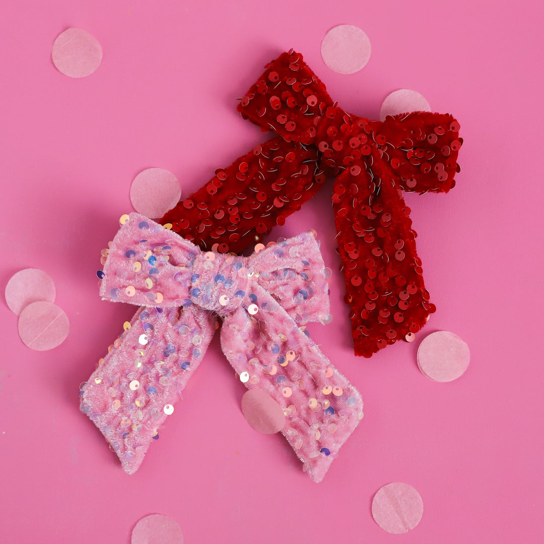 girls' velvet bows with sequins on them made to match valentine's day outfits