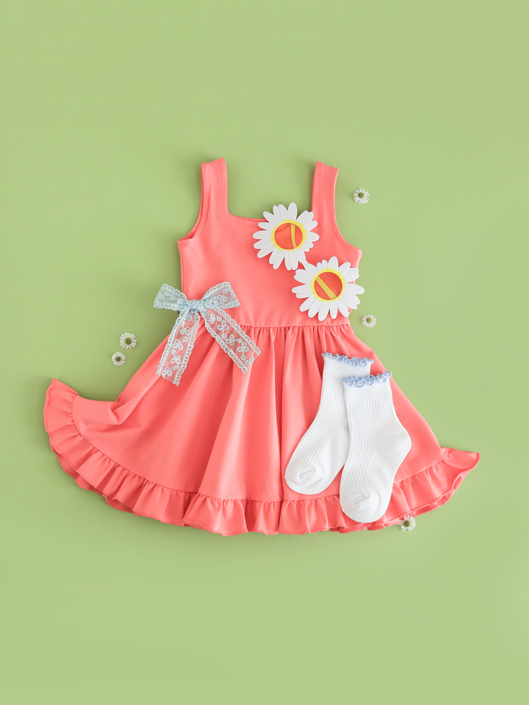 girls coral pink sleeveless twirl dress styled with flower sunglasses, light blue lace bow and white ribbed midi socks with light blue trim