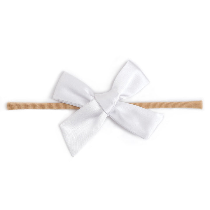 white satin bow on soft nylon band for baby girl 